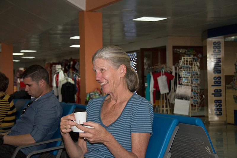 Joan waiting for the delayed flight back to Miami