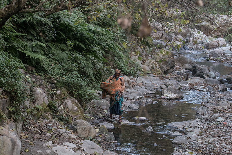 Woman Walking Along River, Naintal, India